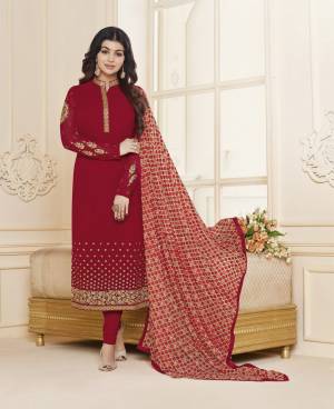 Adorn The Lovely And Attractive Look Wearing This Semi-Stitched Suit In Red Color Paired With Red Colored Bottom And Dupatta. Its Top Is Fabricated On Georgette Paired With Santoon Bottom And Brasso Fabricated Dupatta. Its All Three Fabrics Ensures Superb Comfort All Day Long.