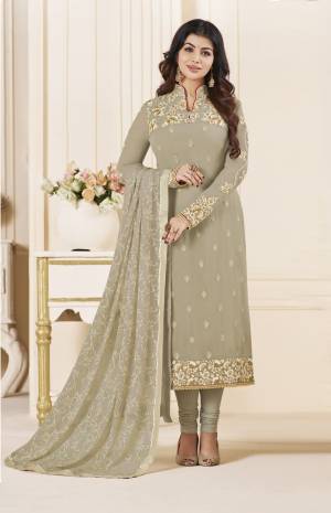 Flaunt Your Rich And Elegant Taste Wearing This Designer Semi-Stitched Suit In Grey Color Paired With Grey Colored Bottom And Dupatta. Its Top Is Fabricated On Georgette Paired With Santoon Bottom And Brasso Dupatta. Its All Three Fabrics And Its Color Will Give Rich Look To Your Personality Like Never Before.