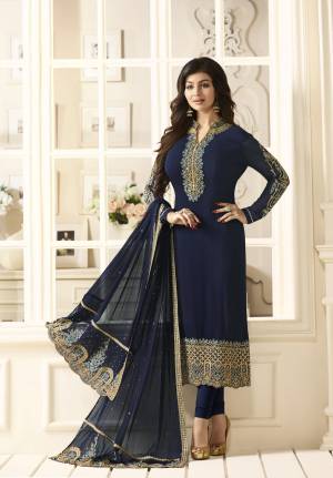 Enhance Your Personality Wearing This Straight Cut Suit In Navy Blue Color Paired With Navy Blue Colored Bottom And Dupatta. Its Top Is Fabricated On Georgette Paired With Santoon Bottom And Chiffon Dupatta. This Suit Is Light Weight And Its Fabrics Ensures Superb Comfort Throughout The Gala.