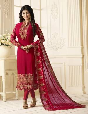 Adorn The Lovely And Attractive Look Wearing This Semi-Stitched Suit In Red Color Paired With Red Colored Bottom And Dupatta. Its Top Is Fabricated On Georgette Paired With Santoon Bottom And Chiffon Fabricated Dupatta. Its All Three Fabrics Ensures Superb Comfort All Day Long.