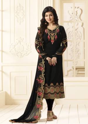 For A Bold, Beautiful And Attractive Look, Grab This Designer Straight Cut Suit In Black Color Paired With Black Colored Bottom And Dupatta. Its Top Is Fabricated On Georgette Paired With Santoon Bottom And Chiffon Dupatta. It Is Beautified With Multi Colored Embroidery All Over. 