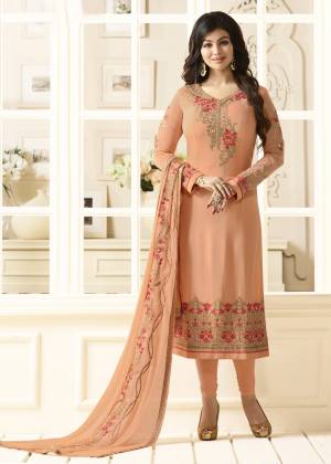 A Must Have Shade In Every Womens Wardrobe Is Here With This Designer Straight Cut Suit In Peach Color Paired With Peach Colored Bottom And Dupatta. Its Top Is Fabricated On Georgette Paired With Santoon Bottom And Chiffon Dupatta. It Is Beautified With Contrasting Embroidery All Over It. Buy Now.