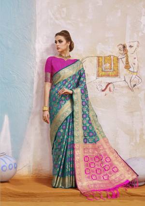 Pretty Unique Shade Is Here In Blue With This Saree In Teal Blue Color Paired With Contarsting Fuschia Pink Colored Blouse. This Saree And Blouse Are Fabricated On Art Silk Beautified With Weave All Over It. Buy Now.