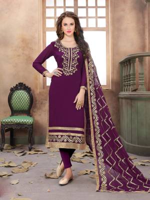 Add This Pretty Semi-Stitched Suit To Your Wardrobe In Purple Color Paired With Purple Colored Bottom And Dupatta. Its Top Is Fabricated On Georgette Paired With Santoon Bottom And Chiffon Dupatta. Its Lovely Color And Gota Work Will Difinitely Earn You Lots Of Compliments.