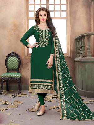 Green, The Color Of Harmony, Grab This Designer Straight Cut Suit In Green Color Paired With Green Colored Bottom And Dupatta. Its Top Is Fabricated On Georgette Paired With Santoon Bottom And Chiffon Dupatta. This Suit Is Light Weight And Its Fabrics Ensures Superb Comfort All Day Long.