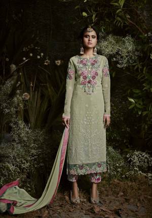 Add This Beautiful Shade In Green With This Designer Suit In Mint Green Color Paired With Mint Green Colored Bottom And Dupatta. Its Top Is Fabricated On Georgette Paired With Santoon Bottom And Chiffon Dupatta. It Has Beautiful Detailed Embroidery With Contrasting Color All Over. Buy This Semi-Stitched Suit Now.