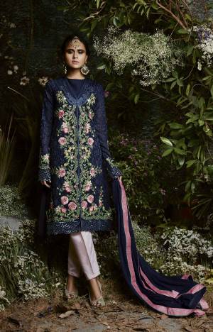 Enhance Your Beauty Wearing This Designer Semi-Stitched Suit In Navy Blue Colored Top Paired With Contrasting Baby Pink Colored Bottom And Navy Blue Colored Dupatta. Its Top Is Fabricated On Georgette Paired With Santoon Bottom And Chiffon Dupatta. Buy This Lovely Suit Now.