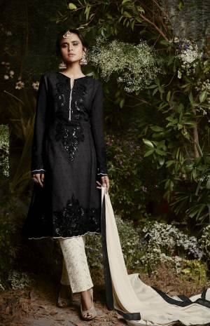 For A Bold And Beautiful Look, Grab This Designer Suit In Black Colored Top Paired With Cream Colored Bottom And Dupatta. Its Top Is Fabricated On Georgette Paired With Santoon Bottom And Chiffon Dupatta. Buy This Semi-Stitched Suit Now.