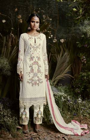 Elegant Looking Suit Is Here In Very Simple Color. Grab This Designer Suit In White Color Paired With White Colored Bottom And Dupatta. Its Top Is Fabricated On Georgette Paired With Santoon Bottom And Chiffon Dupatta. It Has Beautiful Embroidery Over The Top And Bottom Making The Suit More Attractive.