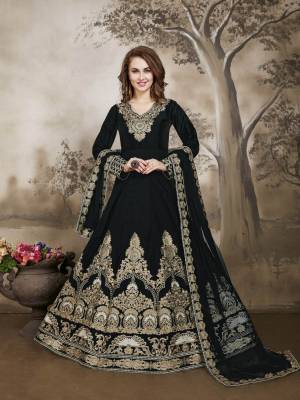Enhance Your Beauty Wearing This Designer Floor Length Suit In Black Color Paired With Black Colored Bottom And Dupatta. Its Top Is Fabricated On Georgette Paired With Santoon Bottom And Net Dupatta. It Is Beautified With Heavy Embroidery. Buy This Semi-Stitched Suit Now.