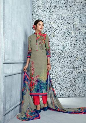 If Those Readymade Suits Does Not Lend You The Desired Comfort, Than Grab This Cotton Dress Material and Get This Stitched As Per Your Desired Fit And Comfort. Its Top And Dupatta Are In Grey And Multi Color Paired With Dark Pink Colored Bottom. Buy This Dress Material For These Summers Now.