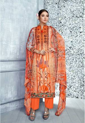 Orange Color Induces Perfect Summery Appeal To Any Outfit, So Grab This Dress Material For Your Casual Wear In Orange Color Paired With Orange Colored Bottom And Dupatta. Its Top Is Fabricated On Cambric Cotton Paired With Cotton Bottom And Chiffon Dupatta. 