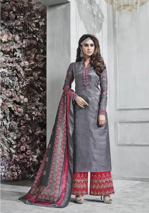 Grab This Beautiful Readymade Suit In Grey Colored Top Paired With Contrasting Pink Colored Bottom And Grey Colored Dupatta. Its Top Is Fabricated On Art Silk Paired With Santoon Bottom And Muslin Dupatta. It Has Embroidery Over All Three Fabrics. Buy Now.