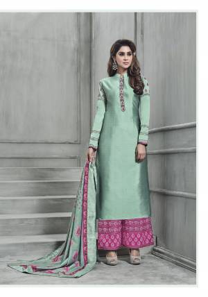 A Very Pretty Shade In Green Is Here With This Designer Readymade Straight Cut Suit In Mint Green Colored Fully Stitched Top Paired With Contrasting Dark Pink Colored Unstitched Bottom And Mint Green Dupatta. Its Top Is Fabricated On Art Silk Paired With Santoon Bottom And Muslin Dupatta. Buy It Now.