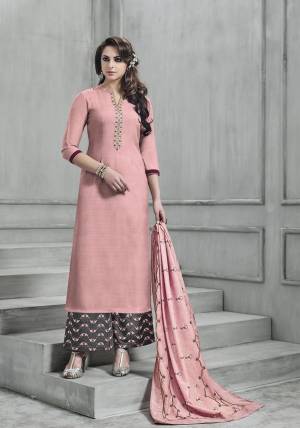 Look Prettiest Of All And Earn Lots Of Compliments Wearing This Designer Readymade Suit In Pastel Pink Color Paired With Contrasting Grey Colored Bottom And Pastel Pink Dupatta. Its Readymade Top Is Fabricated On Art Silk Paired With Unstitched Santoon Bottom And Muslin Fabricated Dupatta. 