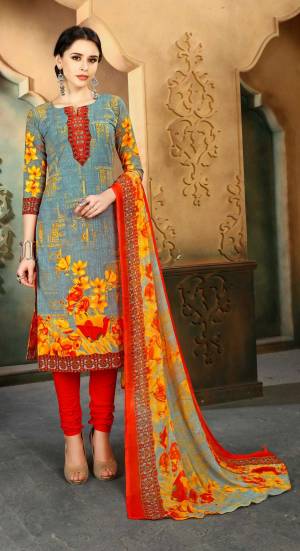 For Your Casual Wear, Grab this Dress Material In Grey Colored Top Paired With Red Colored Bottom And Multi Colored Dupatta. Its Top, Bottom And Dupatta Are Fabricated On Cotton Beautified With Prints All Over It. It Is Light In Weight And Easy To Carry All Day Long.