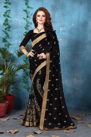 Enhance Your Beauty Wearing This Saree In Black Color Paired With Black Colored Blouse. This Saree And Blouse Are Fabricated On Georgette Beautified With Jari Embroidery All Over It. It Is Light In Weight And Easy To Carry All Day Long.
