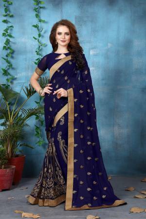 For A Bold And Beautiful Personality, Grab This Saree In Navy Blue Color Paired With Navy Blue Colored Blouse. This Saree And Blouse Are Fabricated On Georgette Beautified With Jari Embroidery All Over It. 