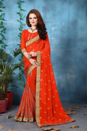 Orange Color Induces Perfect Summery Appeal To Any Outfit, So Grab This Attractive Saree In Orange Color Paired With Orange Colored Blouse. This Saree And Blouse Are Fabricated On Georgette Beautified With Attractive Jari Embroidery. Buy Now.