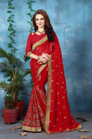 Adorn The Pretty Angelic Look wearing This Saree In Red Color Paired With Red Colored Blouse. This Saree And Blouse Are Fabricated On Georgette Beautified With Jari Embroidery All Over It. It Is Light Weight And Easy To Drape. Buy Now.