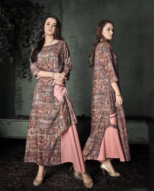 Here Is A Beautiful Shade In Pink With This Readymade Designer Kurti In Dusty Pink Color Fabricated On Rayon Cotton Beautified With Prints. This Readymade Kurti Is Available In Many Sizes. Buy Now.