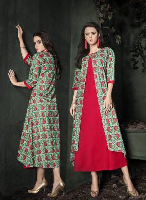 Grab This Traditonal Colored Readymade Kurti In Green And Red Color Fabricated On Rayon Cotton Beautified With Prints All Over It. It Is Soft Towards Skin And Ensures Superb Comfort All Day Long.