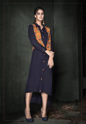 For A Bold And Beautiful Look, Grab This Designer Readymade Kurti In Navy Blue And Orange Color Fabricated On Rayon Cotton. This Fabric Ensures Superb Comfort All Day Long And Also It Is Available In Many Sizes.