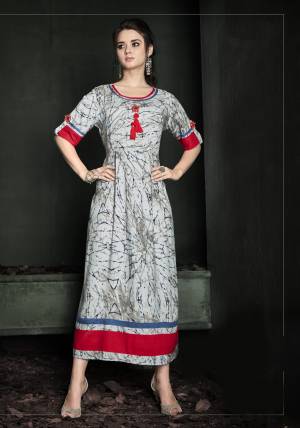 Flaunt Your Rich And Elegant Taste Wearing This Readymade Kurti In Grey Color Fabricated On Rayon Cotton Beautified With Prints. This Kurti Is Light Weight And Easy To Carry All Day Long. Buy Now.