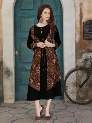 Enhance Your Beauty In Black With This Readymade Kurti In Black And Brown Color Fabricated On Rayon Cotton Beautified With Prints. This Readymade Kurti Is Available In Many Sizes. Buy now.