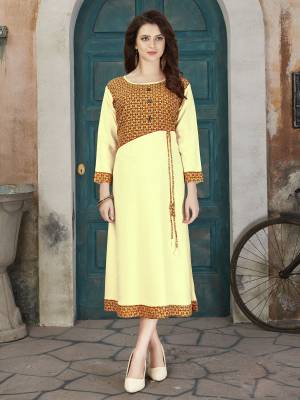 Simple And Elegant Looking Readymade Kurti Is Here In Cream Color Fabricated On Rayon Cotton Beautified With Prints. This Kurti Is Available In Many Sizes And Also It Is Light Weight And Easy To Carry All Day Long.
