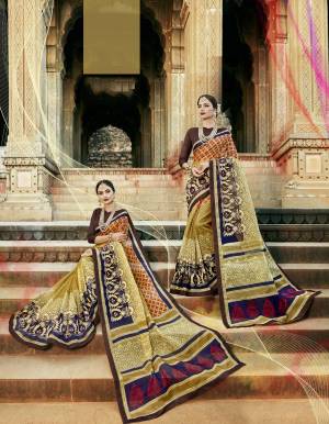 All Color Is Best Color To Wear, Grab This Saree In Multi Color Paired With Brown Colored Blouse. This Saree Is Fabricated On Super Net Cotton Paired With Art Silk Fabricated Blouse. This Saree Is Beautified With Prints And Thread Work. Buy Now.