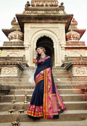 Enhance Your Personality Wearing This Saree In Navy Blue Color Paired With Navy Blue Colored Blouse. This Saree And Blouse Are Fabricated On Art Silk Beautified With Weave Over The Broad Lace Border.