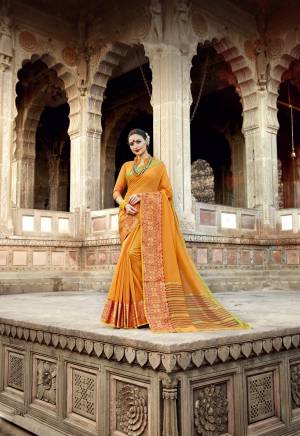 Celebrate This Fesive Season With Beauty And Comfort Wearing This Saree In Musturd Yellow Color Paired With Musturd Yellow Colored Blouse. This Saree And Blouse Are Fabricated On Art Silk Beautified With Weave over The Broad Lace Border. 