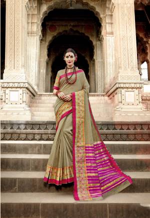 New And Unique Shade In Green Is Here With This Saree In Olive Green Color Paired With Olive Green Colored Blouse. This Saree And Blouse Are Fabricated On Art Silk Beautified With Weave. Buy This Lovely Saree Now.