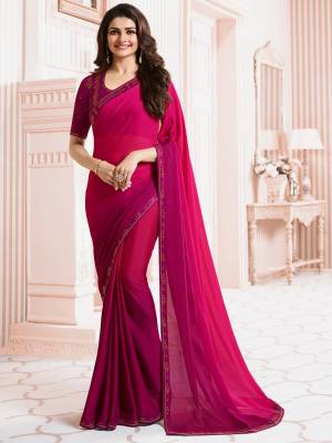 Look Pretty Wearing This Saree In Dark Pink Color Paired With Magenta Pink Colored Blouse. This Saree Is Fabricated On Georgette Paired With Art Silk Fabricated Blouse. Its Lovely Colors Shades And Fabric Will Earn You Lots Of Compliments From Onlookers.