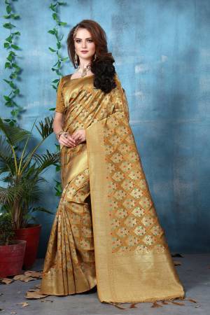 Celebrate This Festive Seaosn Wearing this Pretty Saree In Light Brown Color Paired With Light Brown Colored Blouse. This Saree And Blouse Are Fabricated On Banarasi Art Silk Beautified With Weave. Its Fabric Also Ensures Superb Comfort All Day Long. Buy Now.