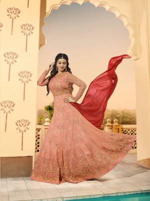 Look Pretty Wearing This Designer Floor Length Suit In Baby Pink Colored Top Paired With Baby Pink Colored Bottom And Contrasting Red Colored Dupatta. Its Top Is Fabricated On Georgette Paired With Santoon Bottom And Chiffon Dupatta. It Is Beautified With Heavy Embroidery Over The Top.