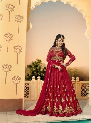 Adorn The Pretty Angelic Look Wearing This Designer Floor Length Suit In Red Color Paired With Red Colored Bottom and Dupatta. Its Top Is Fabricated On Georgette Paired With Santoon Bottom And Chiffon Dupatta. This Suit Will Definitely Earn You Lots Of Compliments From Onlookers. Buy Now.