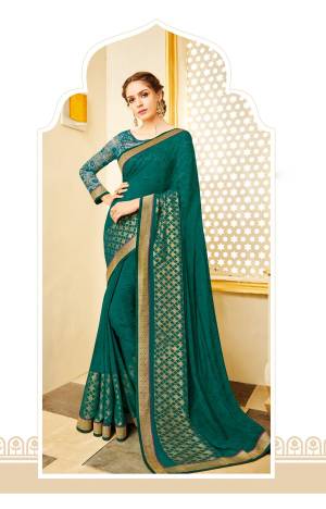 Add This New Shade In Green To Your Wadrobe Wearing This Saree In Teal Green Color Paired With Teal Green Colored Blouse. This Saree Is Fabricated On Georgette Paired With Net Fabricated Blouse. It Has Attractive Lace Border Over The Saree. Buy Now.
