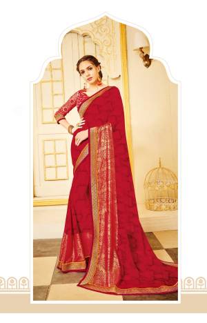 Adorn the Pretty Angelic Look Wearing This Saree In Red Color Paired With Red Colored Blouse. This Saree Is Fabricated On Georgette Paired With Net Fabricated Blouse. Both The Fabrics Ensures Superb Comfort All Day Long.