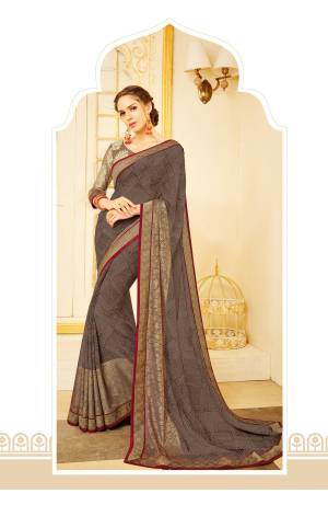 Flaunt Your Rich And Elegant Taste Wearing This Saree In Grey Color Paired With Grey Colored Blouse. This Saree Is Fabricated On Georgette Paired With Net Fabricated Blouse. Buy This Elegant Looking Saree Now.