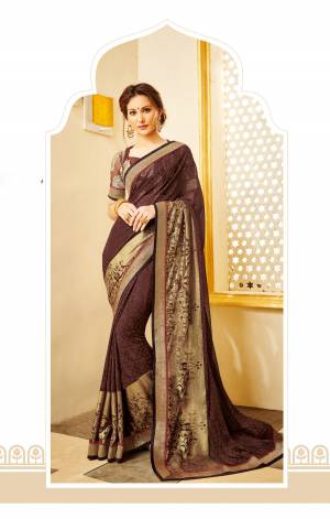 Flaunt Your Rich And Elegant Taste Wearing This Saree In Brown Color Paired With Brown Colored Blouse. This Saree Is Fabricated On Georgette Paired With Net Fabricated Blouse. Buy This Elegant Looking Saree Now.