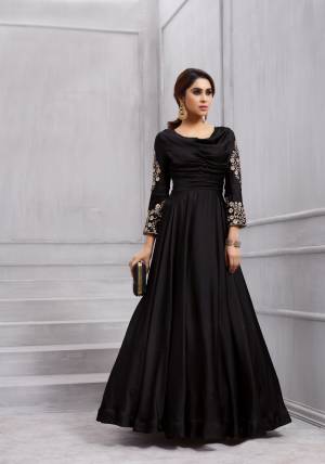 For A Bold And Beautiful Look, Grab This Designer Floor Length Suit In Black Color Paired With Black colored Bottom And Dupatta. Its Has Stitched Readymade Top Fabricated On Art Silk Paired With Santoon Unstitched Bottom And Chiffon Dupatta. Buy This Designer Suit Now.