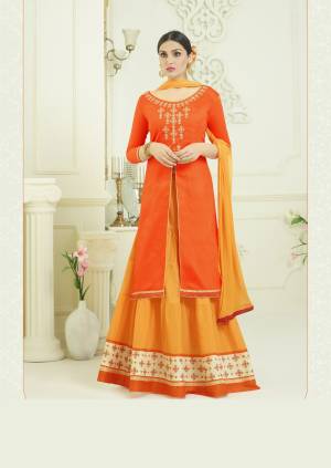 Orange And Yellow , Such Bright Colors Induces Perfect Summery Appeal To Any Outfit, So Grab This Designer Lehenga Suit In Orange Colored Top Paired With Contrasting Yellow Colored Bottom And Dupatta. Its Top And Lehenga Are Fabricated On Cotton Paired With Chiffon Dupatta. It Is Light Weight And Easy To Carry All Day Long.
