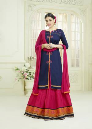 Enhance Your Beauty Wearing This Designer Lehenga Suit In Navy Blue Colored Top Paired With Contrasting Dark Pink Colored Lehenga And Dupatta. Its Top And Lehenga Are Fabricated On Cotton Paired With Chiffon Dupatta. All Its Fabric Ensures Superb Comfort All Day Long.