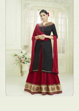 Adorn The Bold And Beautiful Look With This Designer Lehenga Suit In Black Colored Top Paired With Maroon Colored Lehenga And Dupatta. Its Top And Lehenga Are Fabricated On Cotton Paired With Chiffon Dupatta. It Has Attractive Embroidery Over The Top And Lehenga.  Buy Now.