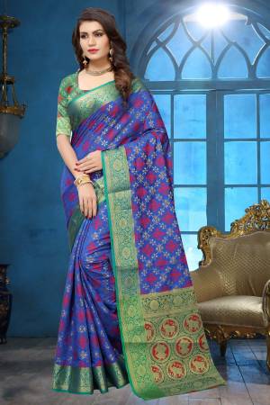 Celebrate This Festive Season Wearing This Saree In Dark Blue Color Paired With Contrasting Green Colored Blouse. This Saree Is Fabricated On Jacquard Silk Paired With Art Silk Fabricated Blouse. It Is Easy To Drape And Carry All Day Long.