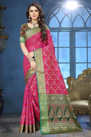 Attract All Wearing This Saree In Fushia Pink Color Paired With Contrasting Dark Green Colored Blouse. This Saree Is Fabricated On Jacquard Silk Paired With Art Silk Fabricated Blouse. It Is Beautified With weave All Over It. Buy Now.