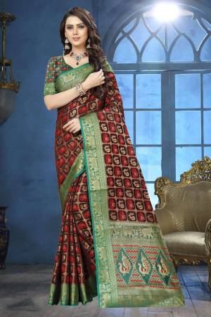 Enhance Your Beauty Wearing This Silk Saree In Dark Brown Color Paired With Contrasting Green Colored Blouse. This Saree Is Fabricated On Jacquard Silk Paired With Art Silk Fabricated Blouse. Its Fabric And Color Gives A Rich Look To Your Personality. 