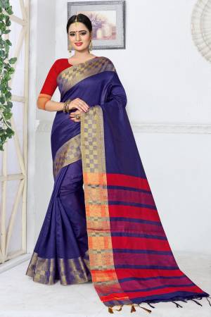 Bright And Visually Appealing Color Is Here With This Saree In Violet Color Paired With Contrasting Red Colored Blouse. This Saree And Blouse Are Fabricated On Kanjivaram Art Silk. Buy This Saree Now.